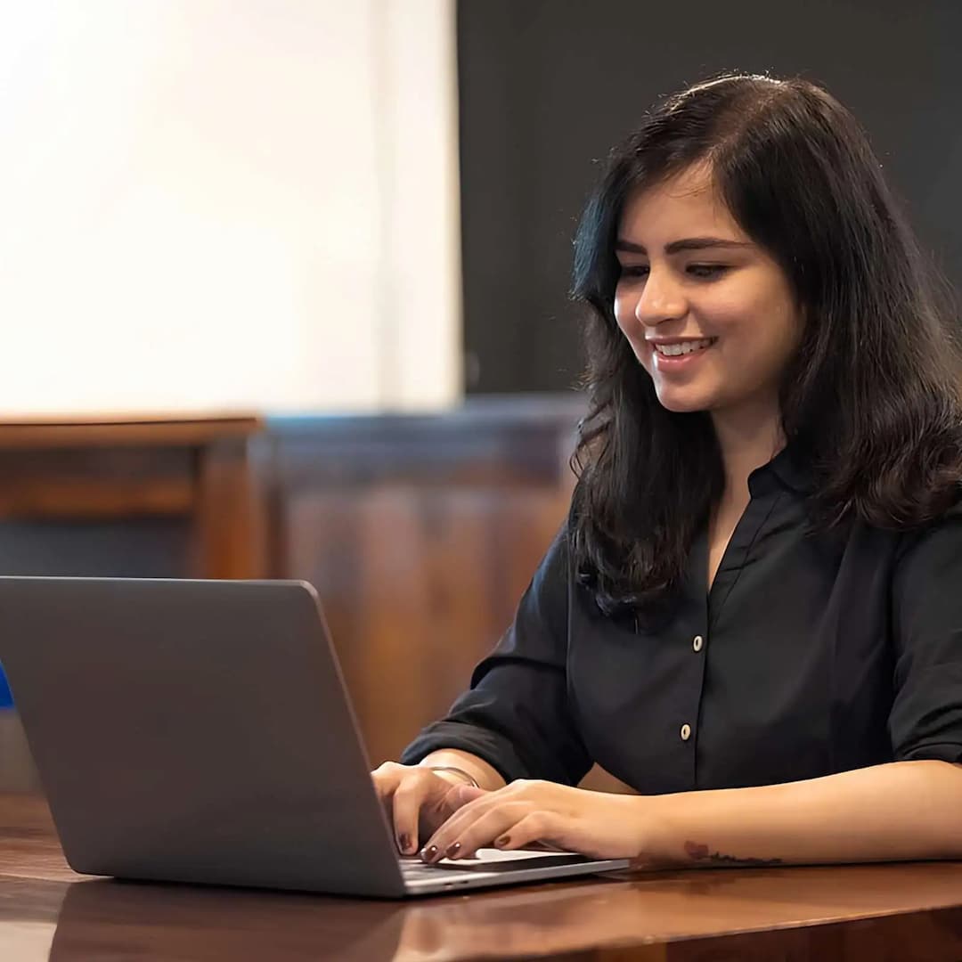 NMIMS Distance MBA student studying online from home distance learning program India